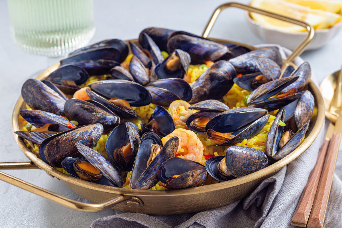 Seafood paella with mussels and shrimp.