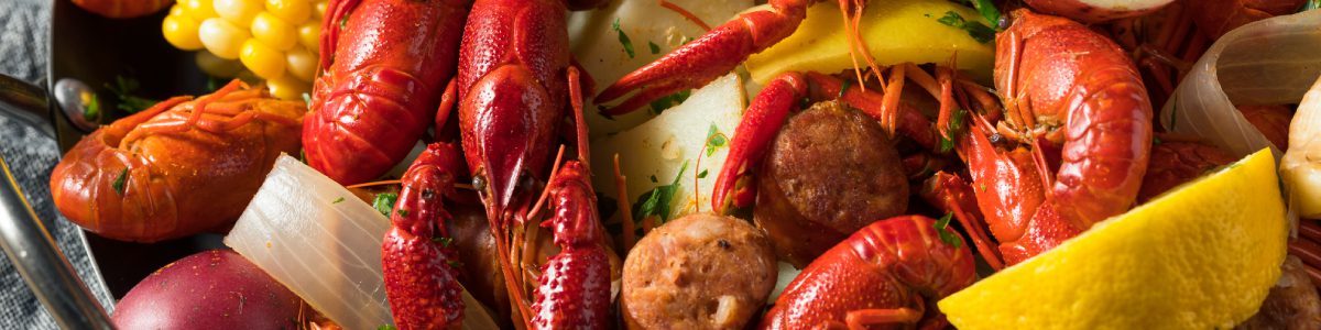 Crawfish boil with corn and sausage.